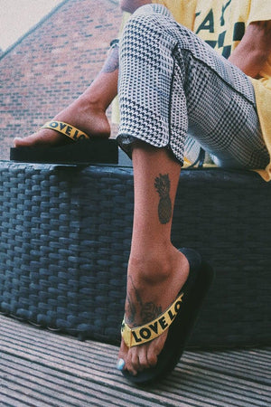 Yellow Slogan tape Platform Flip Flops - Zyriana